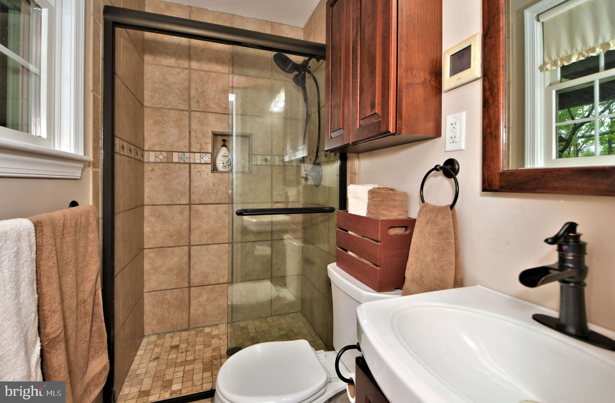 24 Moyer Road Telford, PA 18969 - Photo 26 of 62 a bathroom with a sink toilet and shower