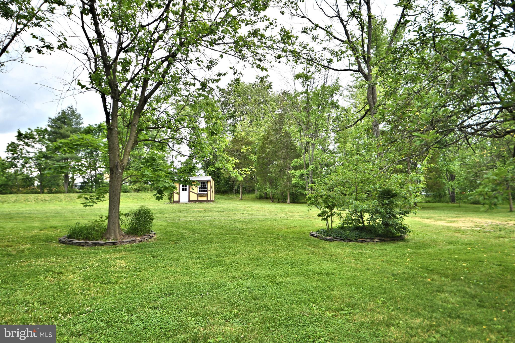 24 Moyer Road Telford, PA 18969 - Photo 37 of 62 a huge green field with lots of trees