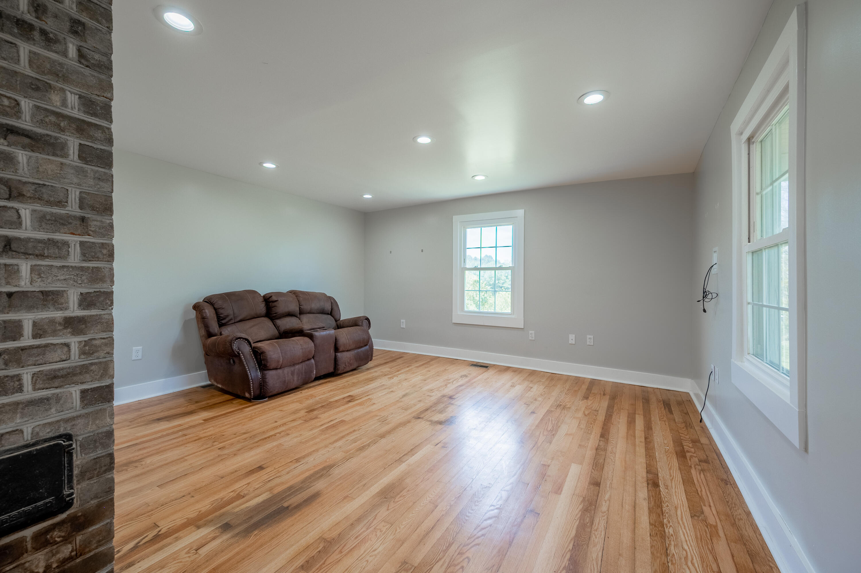 1463 Moore Road Northeast Floyd, VA 24091 - Photo 31 of 90 a living room with furniture and a wooden floor