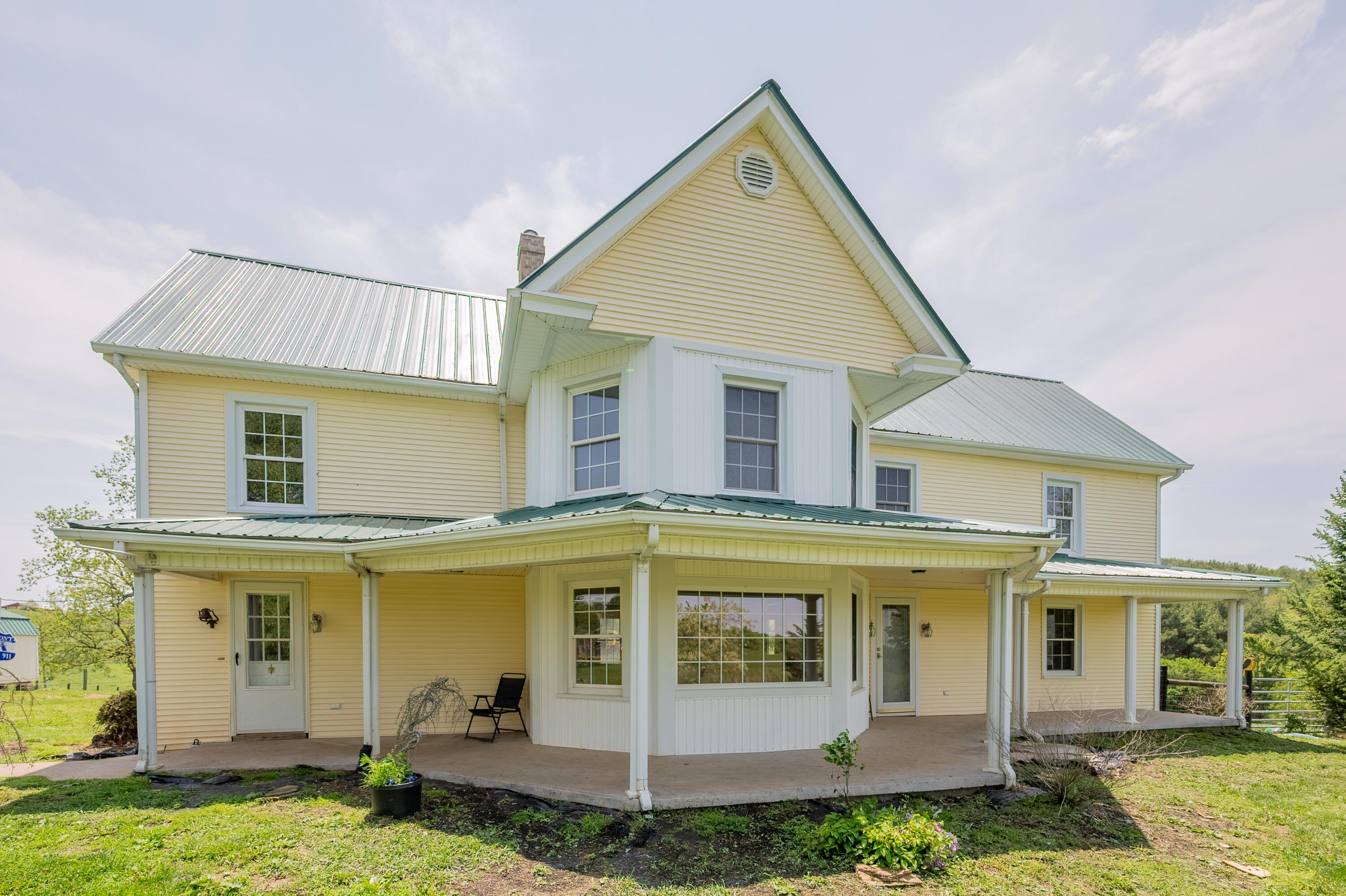 1463 Moore Road Northeast Floyd, VA 24091 - Photo 67 of 90 a view of a white house with large windows