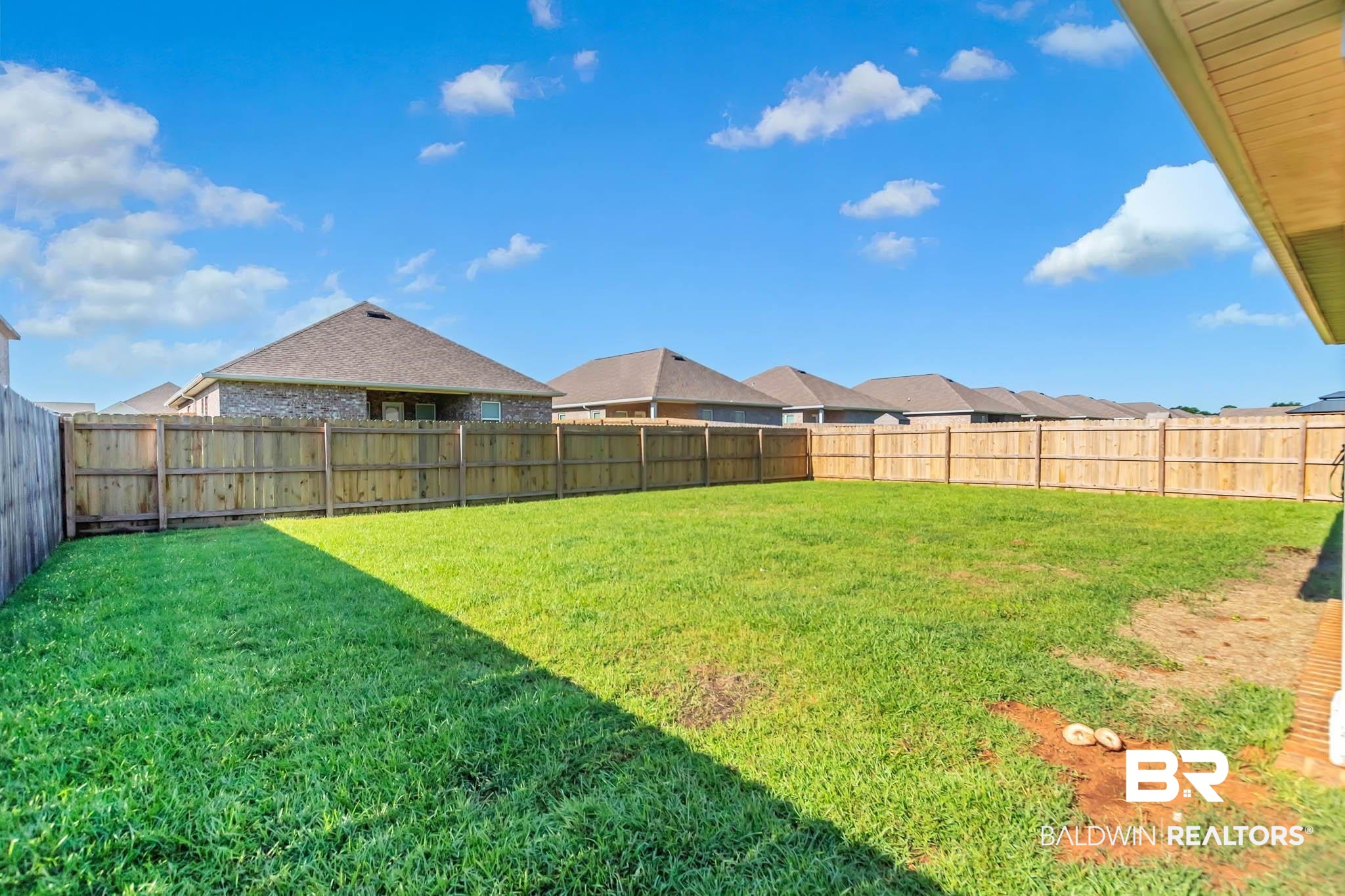 16461 Prado Loop Loxley, AL 36551 - Photo 68 of 78 Fenced backyard with a residential view