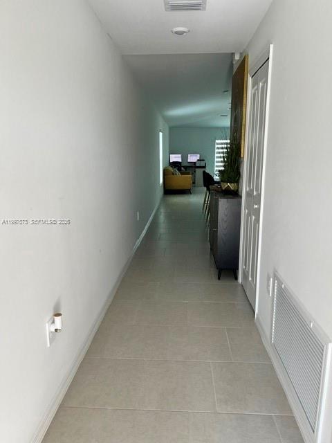 19709 Garden Ridge, Unit 19709 Lehigh Acres, FL 33974 - Photo 5 of 11 a view of storage and utility room in a kitchen