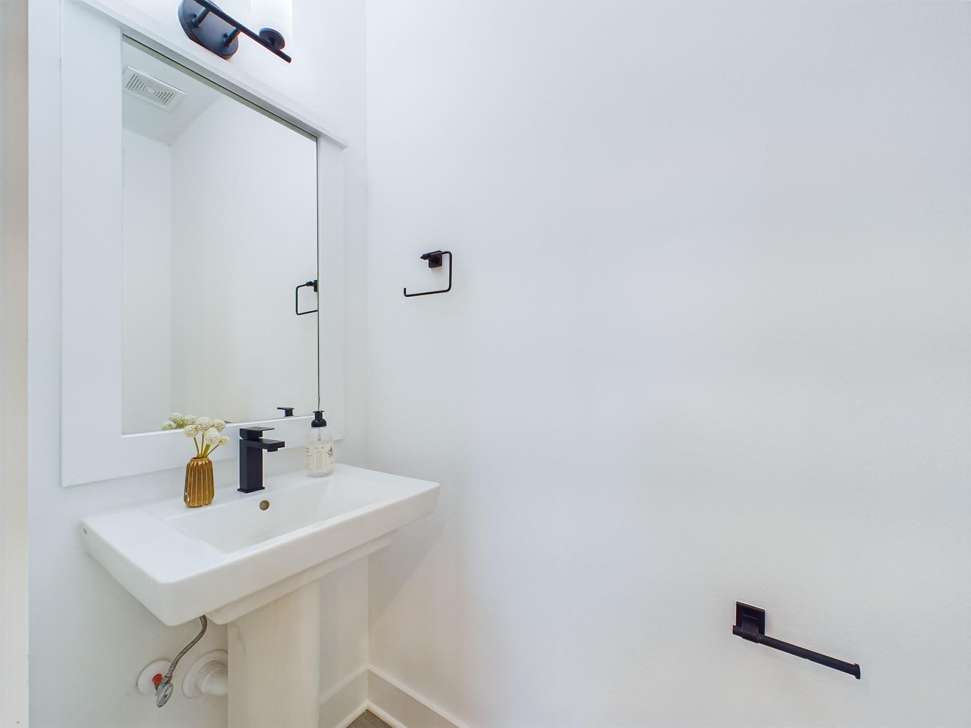 8319 Springwood Drive Houston, TX 77055 - Photo 14 of 47 Powder room conveniently located on the second floor!