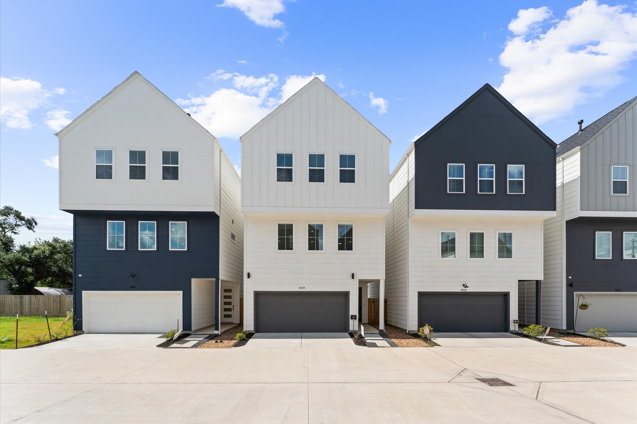 8319 Springwood Drive Houston, TX 77055 - Photo 2 of 47 8319 Springwood Canyon Ln. - Step into this beautifully designed residence featuring a spacious open-concept layout perfect for entertaining. The first floor offers a versatile flex room ideal for a home office, gym, or guest suite. Ascend to the third floor to discover three generously sized bedrooms, including a luxurious primary suite with ample closet space.