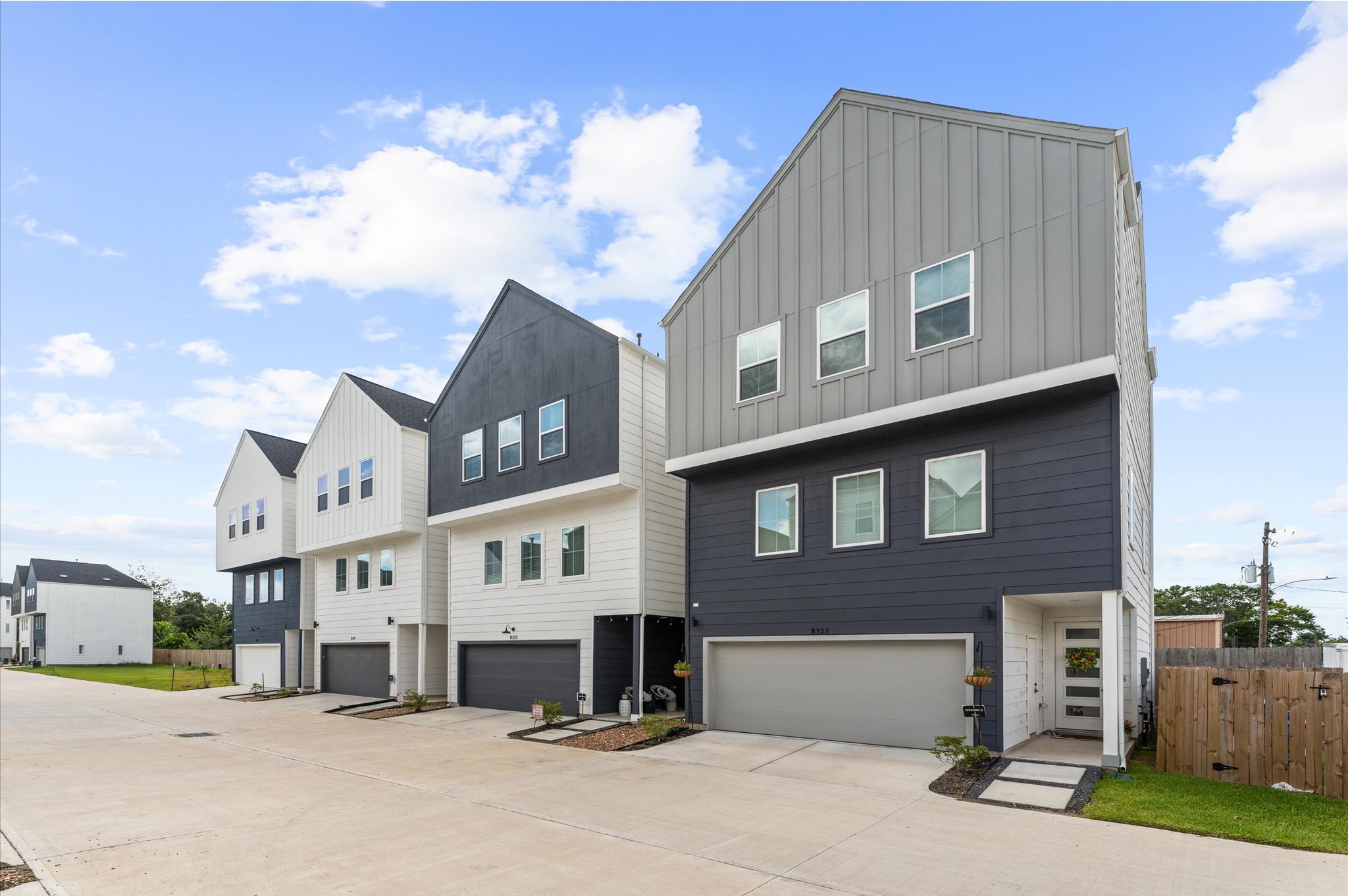 8319 Springwood Drive Houston, TX 77055 - Photo 28 of 47 8317 Springwood Canyon Ln. - Step into this beautifully designed residence featuring a spacious open-concept layout perfect for entertaining. The first floor offers a versatile flex room ideal for a home office, gym, or guest suite. Ascend to the third floor to discover three generously sized bedrooms, including a luxurious primary suite with ample closet space.