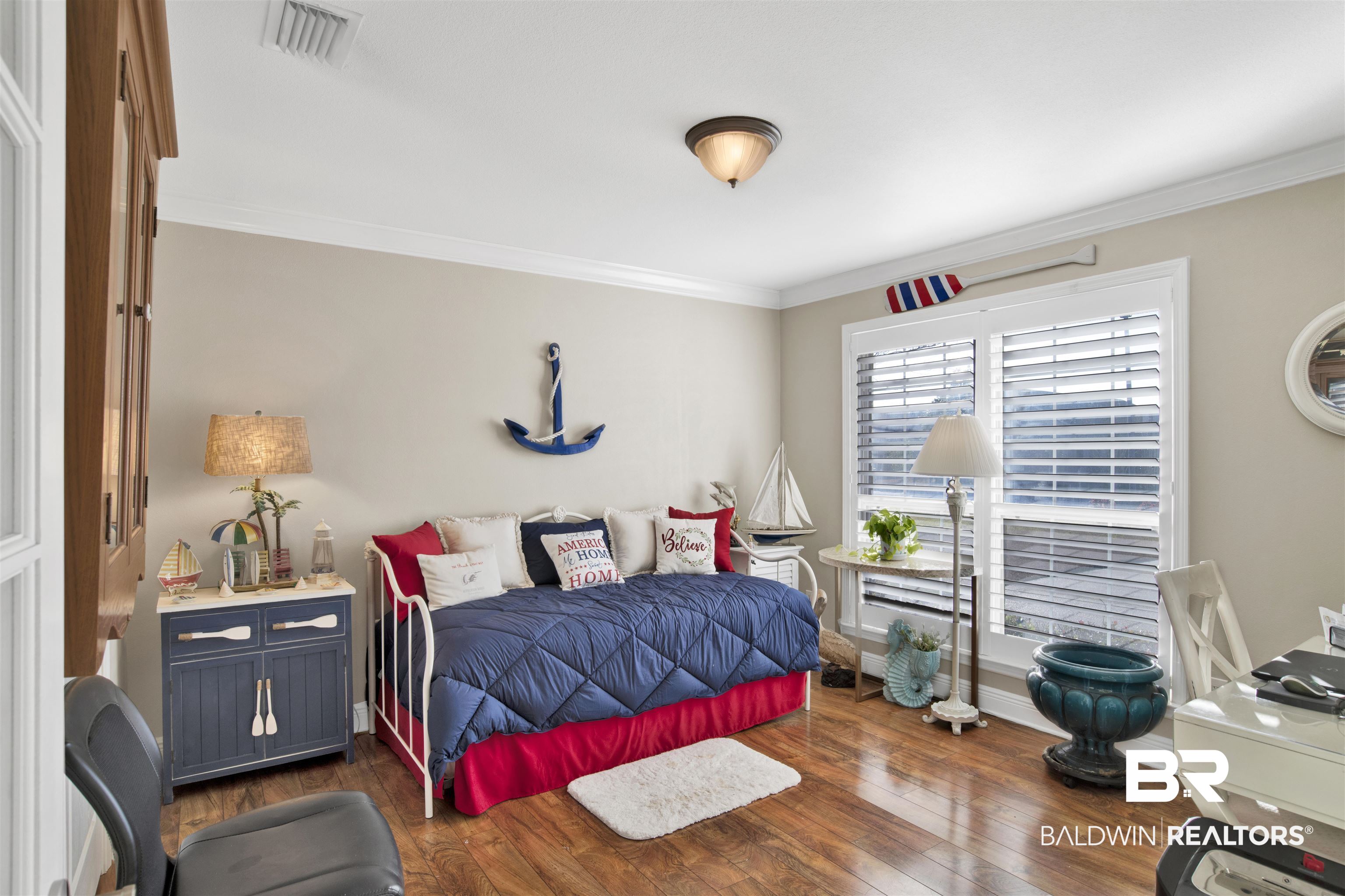 314 Blackfriars Street Fairhope, AL 36532 - Photo 20 of 25 Bedroom with crown molding and dark hardwood / wood-style flooring