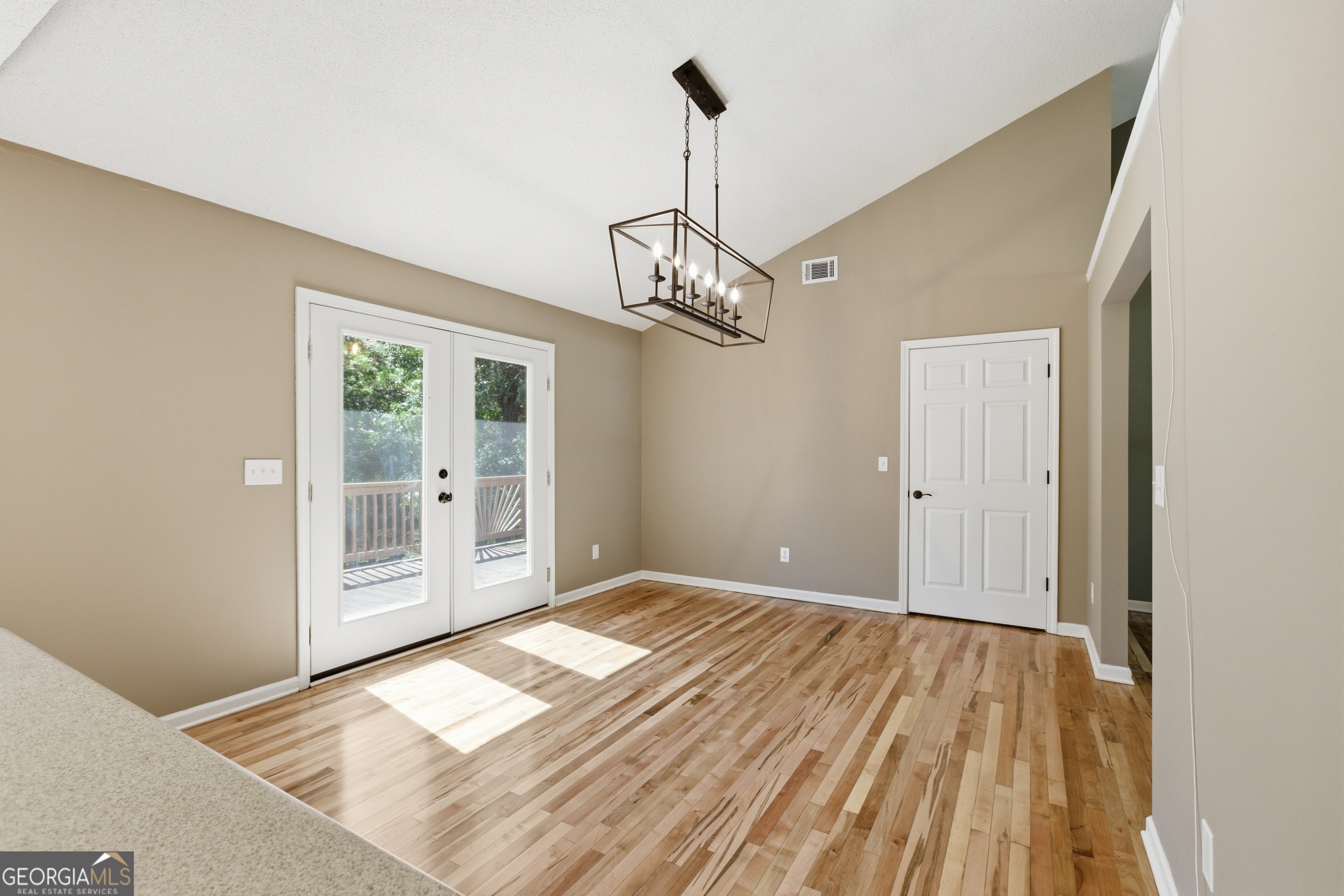 171 Winding Way Hartwell, GA 30643 - Photo 16 of 37 a view of a room with wooden floor staircase and front door