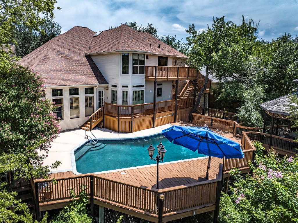 9311 Ashton Ridge Austin, TX 78750 - Photo 1 of 1 a view of a house with backyard and sitting area