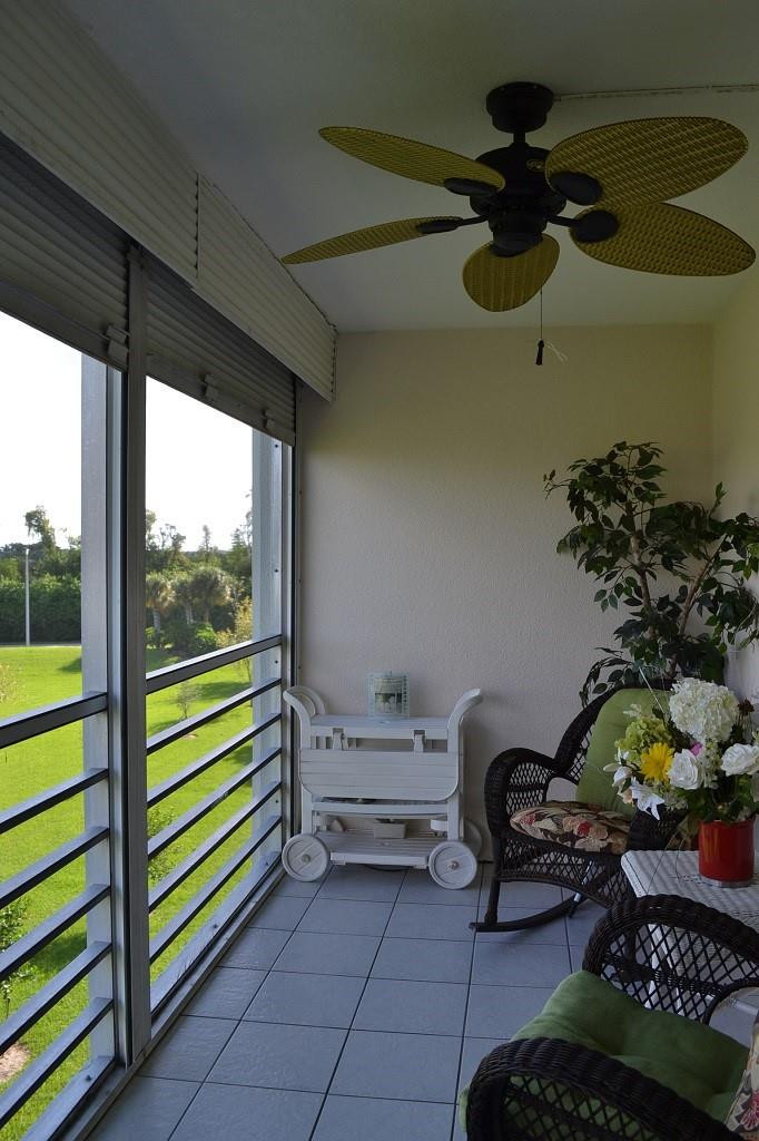 4013 Lincoln A, Unit 4013 Boca Raton, FL 33434 - Photo 13 of 28 Screened Balcony with pull down shutters