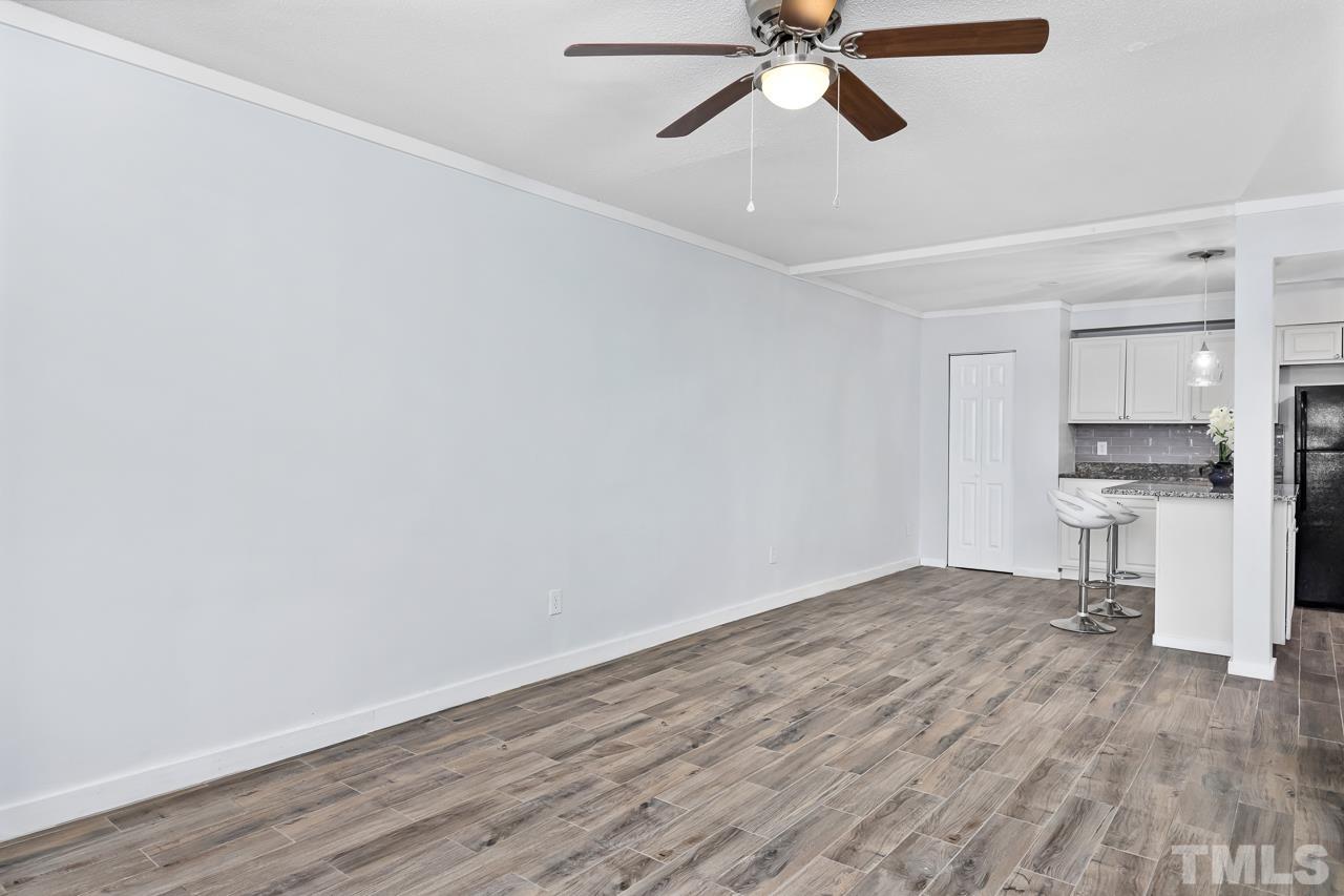 7002 Longstreet Drive, Unit C Raleigh, NC 27615 - Photo 4 of 18 a view of a room with a sink and a window