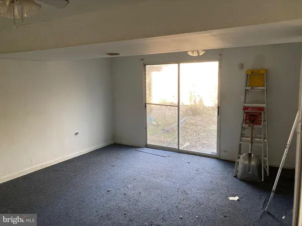 a bathroom with a sink a toilet and bathtub