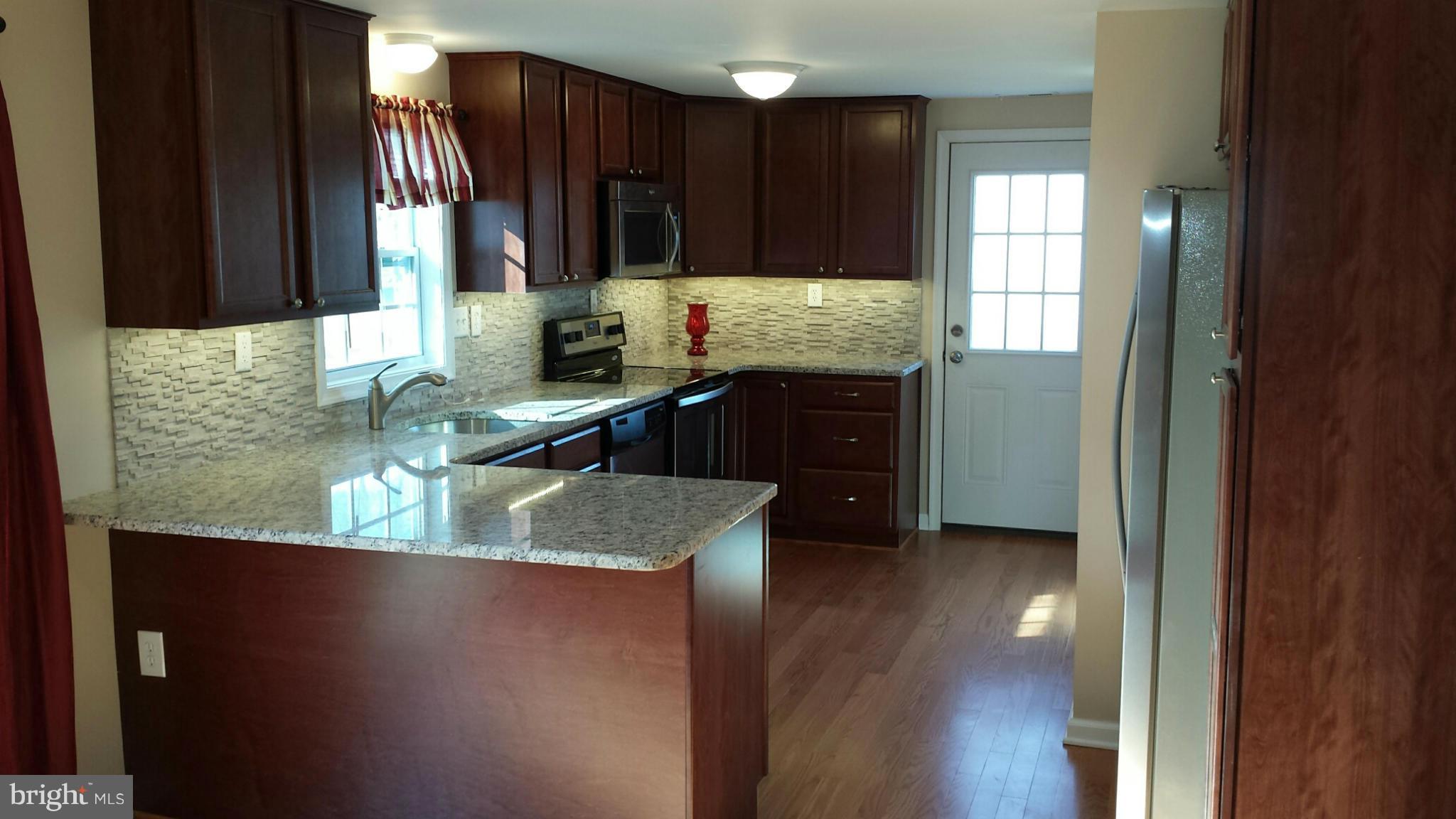 715 Old Love Point Road Stevensville, MD 21666 - Photo 7 of 29 Full Kitchen