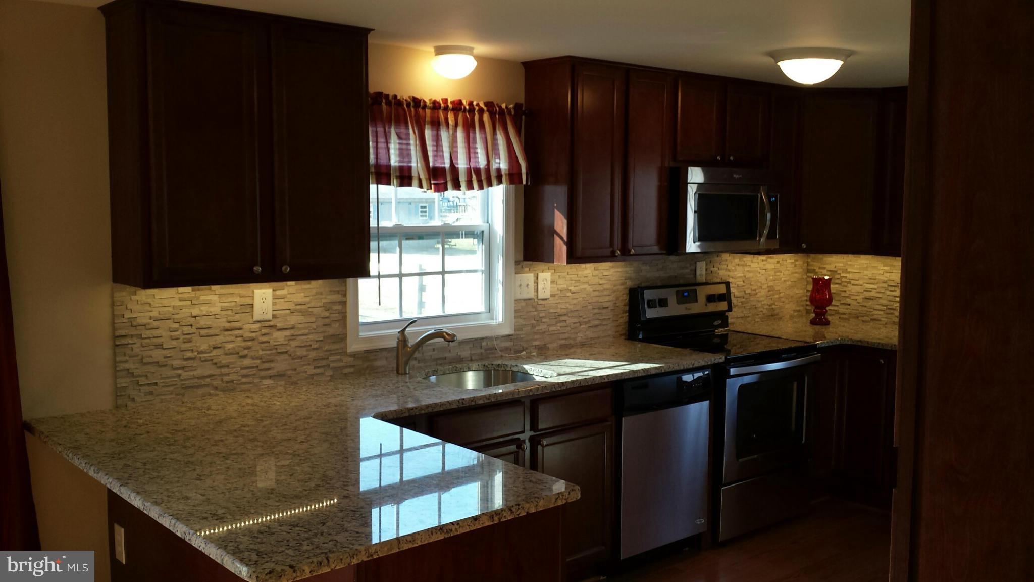 715 Old Love Point Road Stevensville, MD 21666 - Photo 8 of 29 Kitchen Left