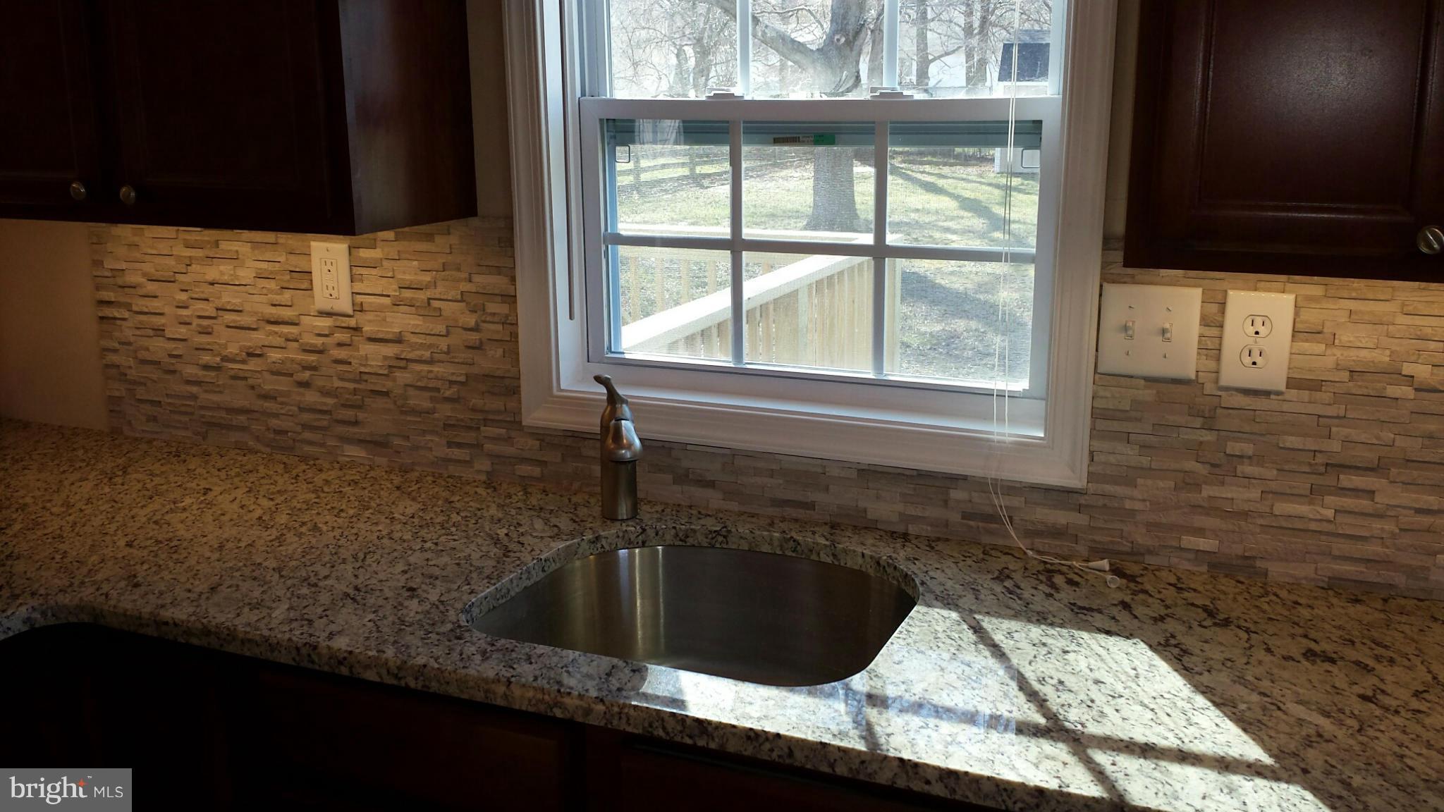 715 Old Love Point Road Stevensville, MD 21666 - Photo 9 of 29 Center Kitchen