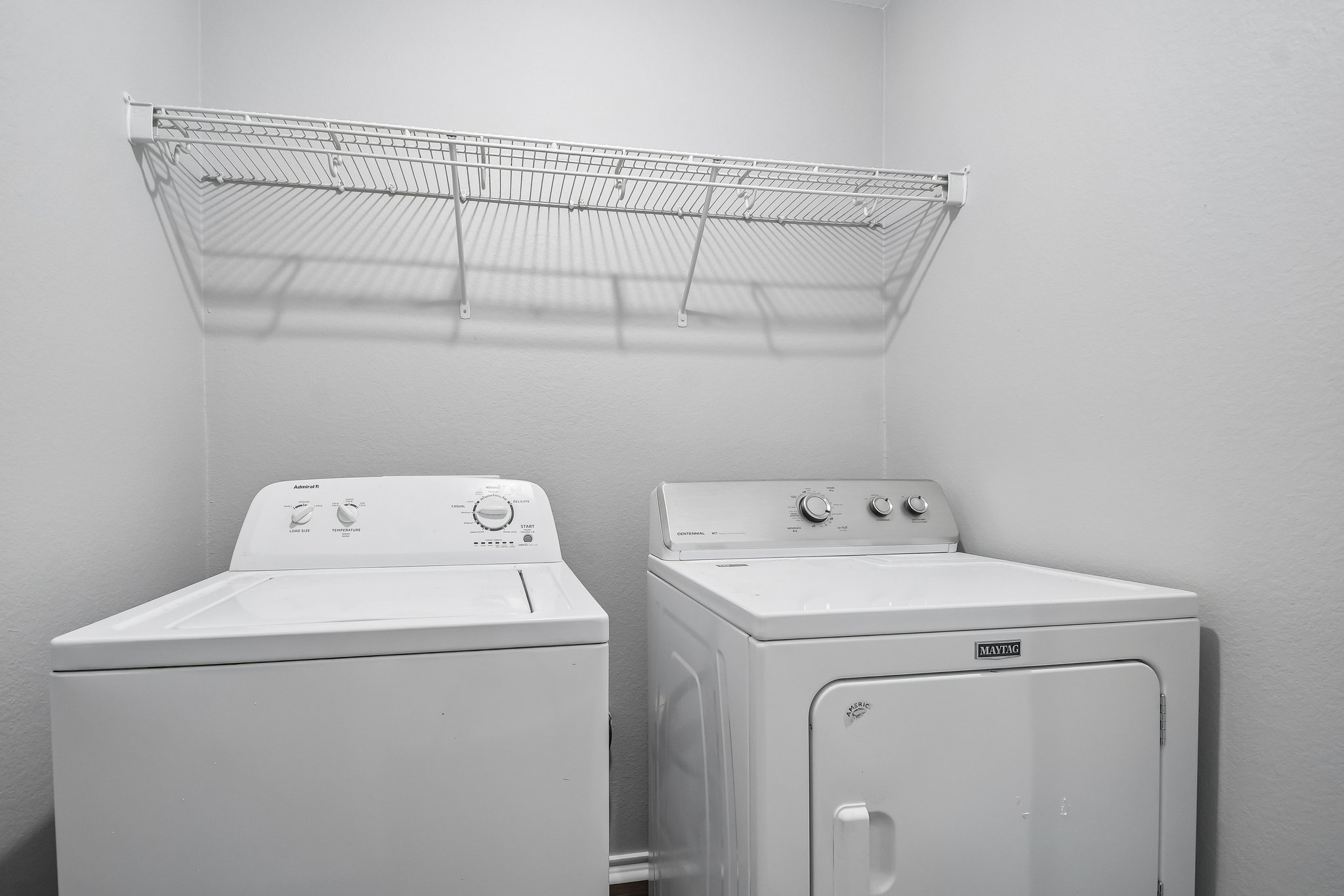 610 Lavaca Loop Elgin, TX 78621 - Photo 31 of 37 A dedicated laundry space offers convenience with a full-sized washer and dryer.