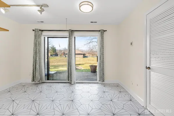 an empty room with windows