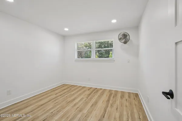 a view of house with yard