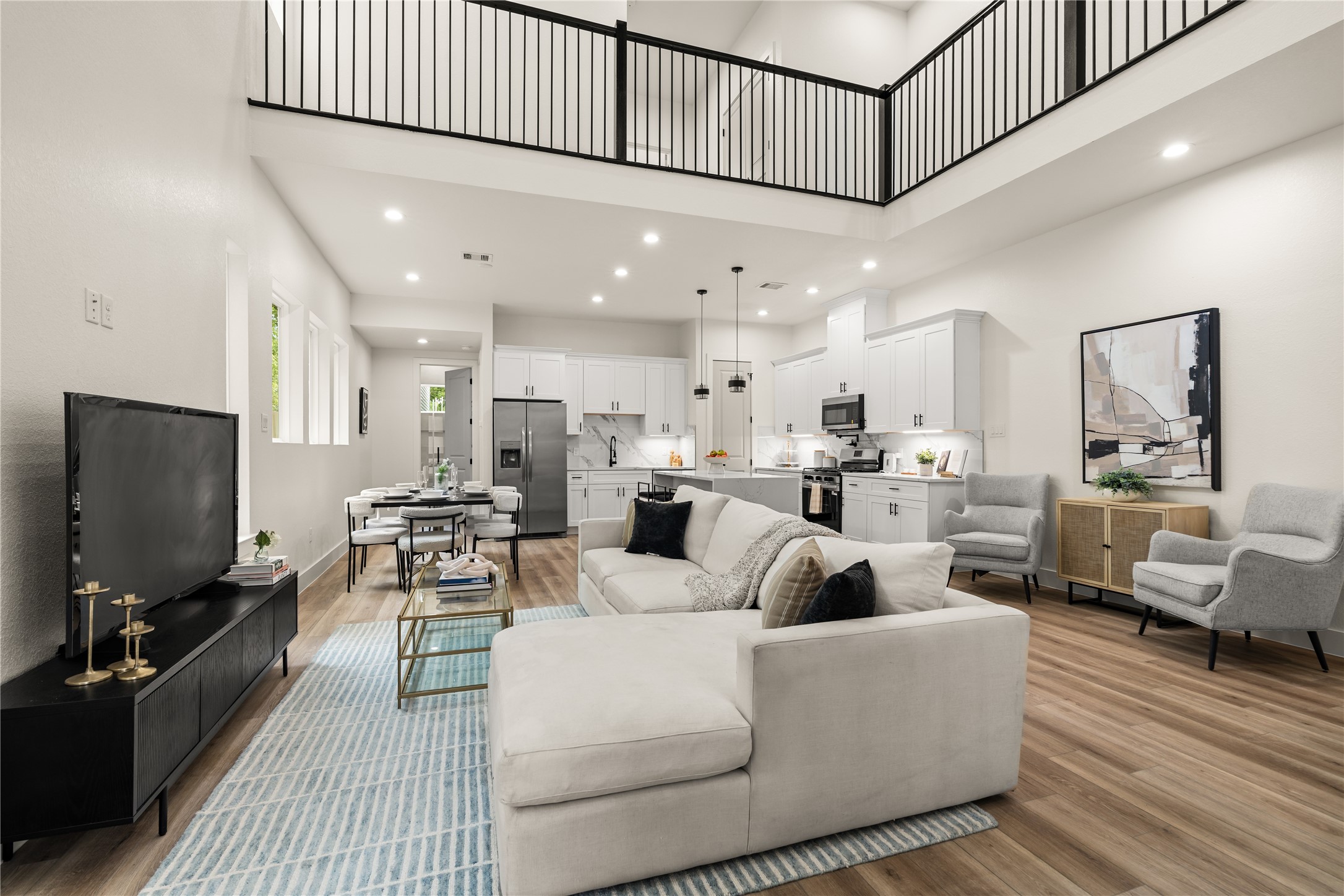 3539 Mainer Street, Unit B Houston, TX 77021 - Photo 2 of 29 20 feet of ceiling height anchoring an open-concept main living area
