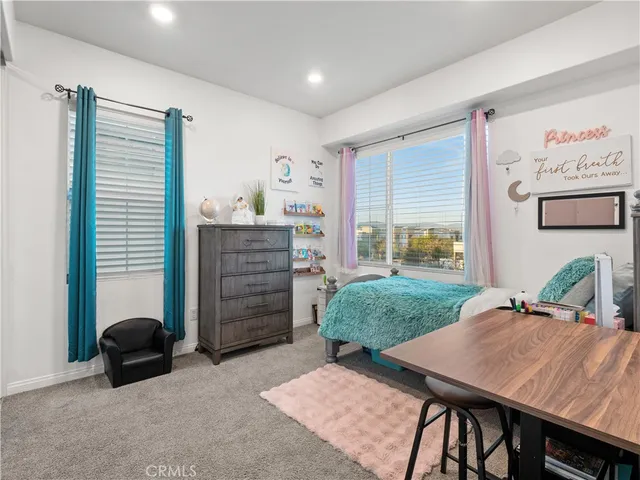 a workspace with furniture and window