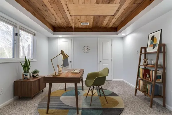 a view of a livingroom with furniture and a couch