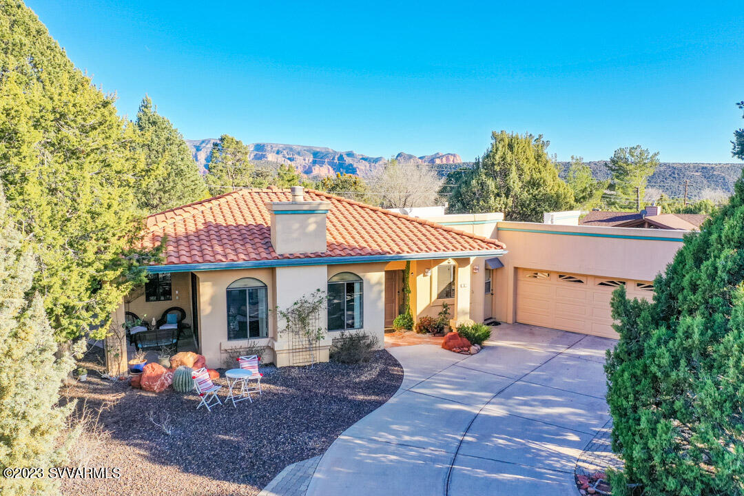 55 Roundup Road Sedona, AZ 86336 - Photo 1 of 35 a view of a house with sitting area