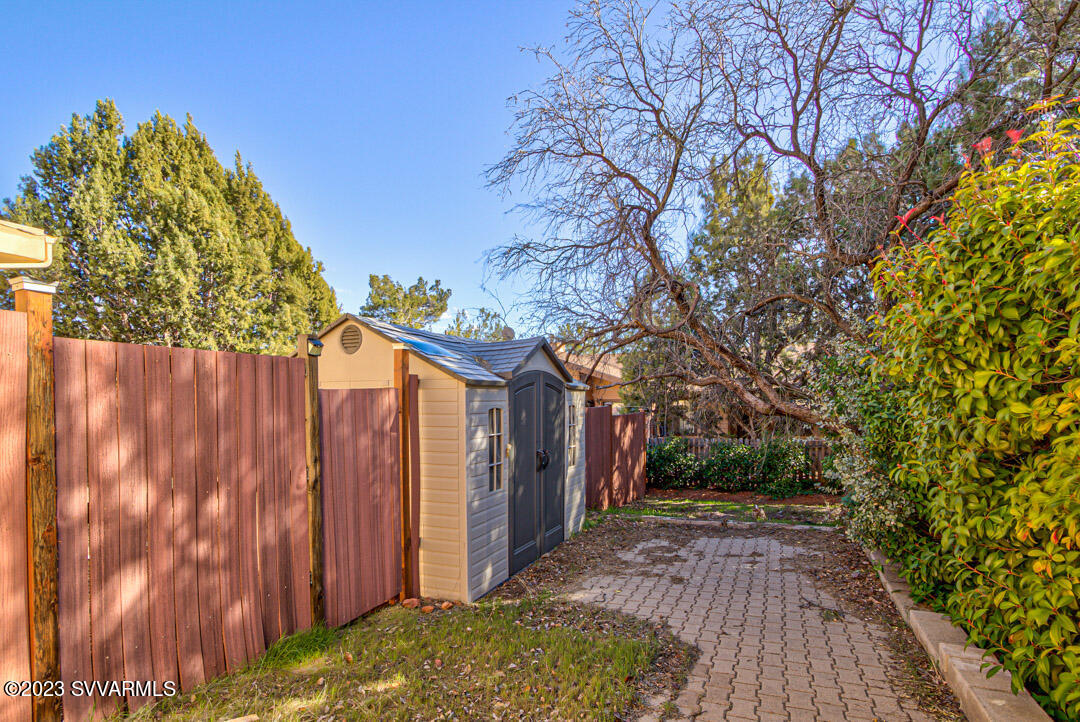 55 Roundup Road Sedona, AZ 86336 - Photo 33 of 35 a view of a backyard with pathway
