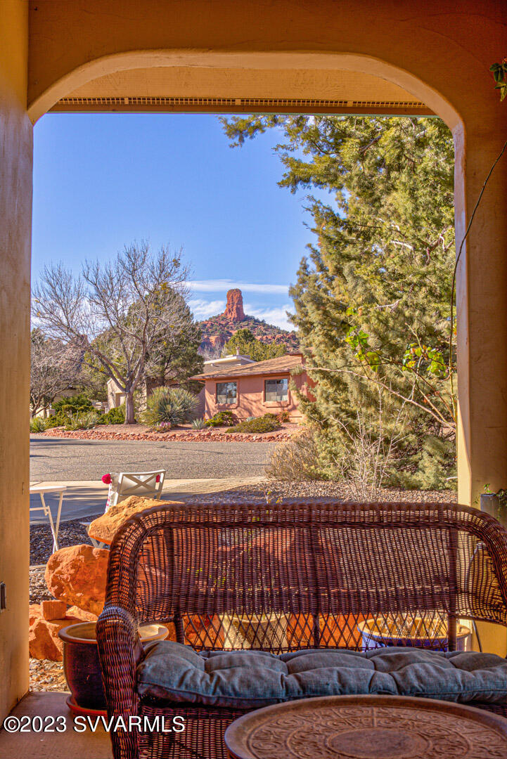 55 Roundup Road Sedona, AZ 86336 - Photo 10 of 35 a view of a balcony with floor to ceiling windows