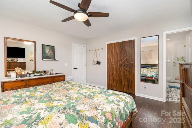 a bed room with a bed and a window