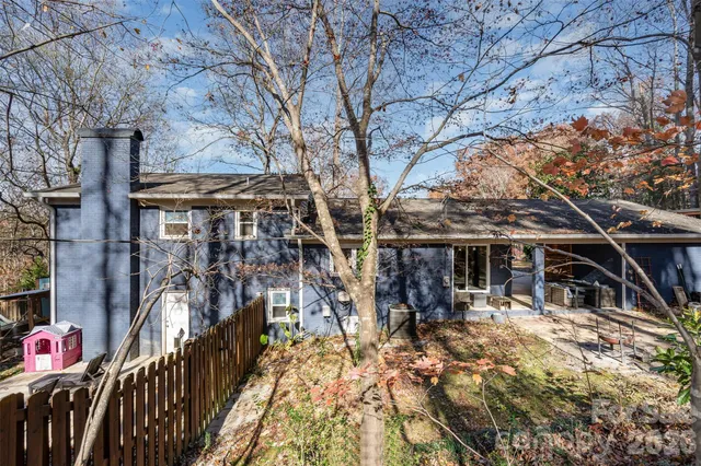 a kitchen with stainless steel appliances a sink stove and refrigerator