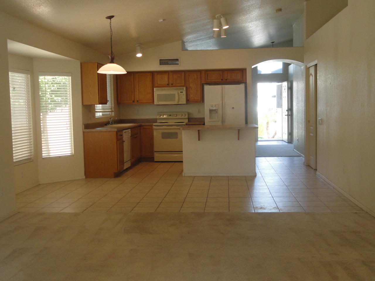 12913 West Cheery Lynn Road Avondale, AZ 85392 - Photo 5 of 15 VAULTED CEILINGS WITH NOOKS IN LIVING RM