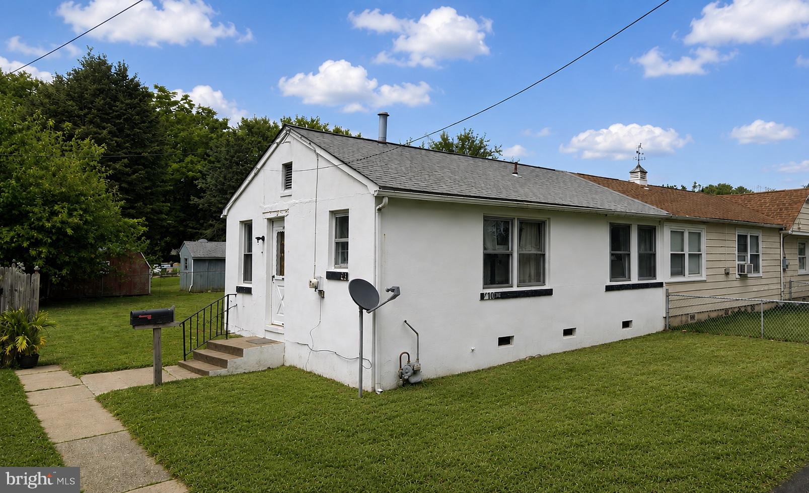 410 Austin Court Wallingford, PA 19086 - Photo 16 of 16 Charming home with lush green yard.