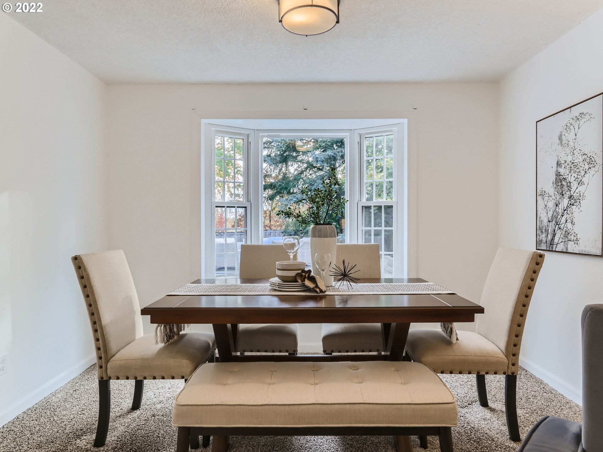 12300 Southwest Davies Road Beaverton, OR 97008 - Photo 11 of 31 a view of a dining room with furniture and window