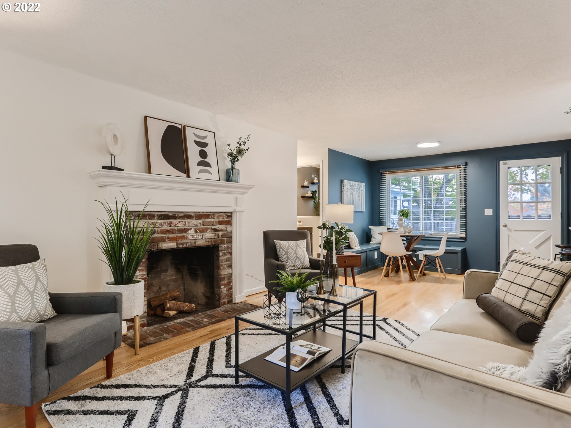12300 Southwest Davies Road Beaverton, OR 97008 - Photo 16 of 31 a living room with furniture and a fireplace