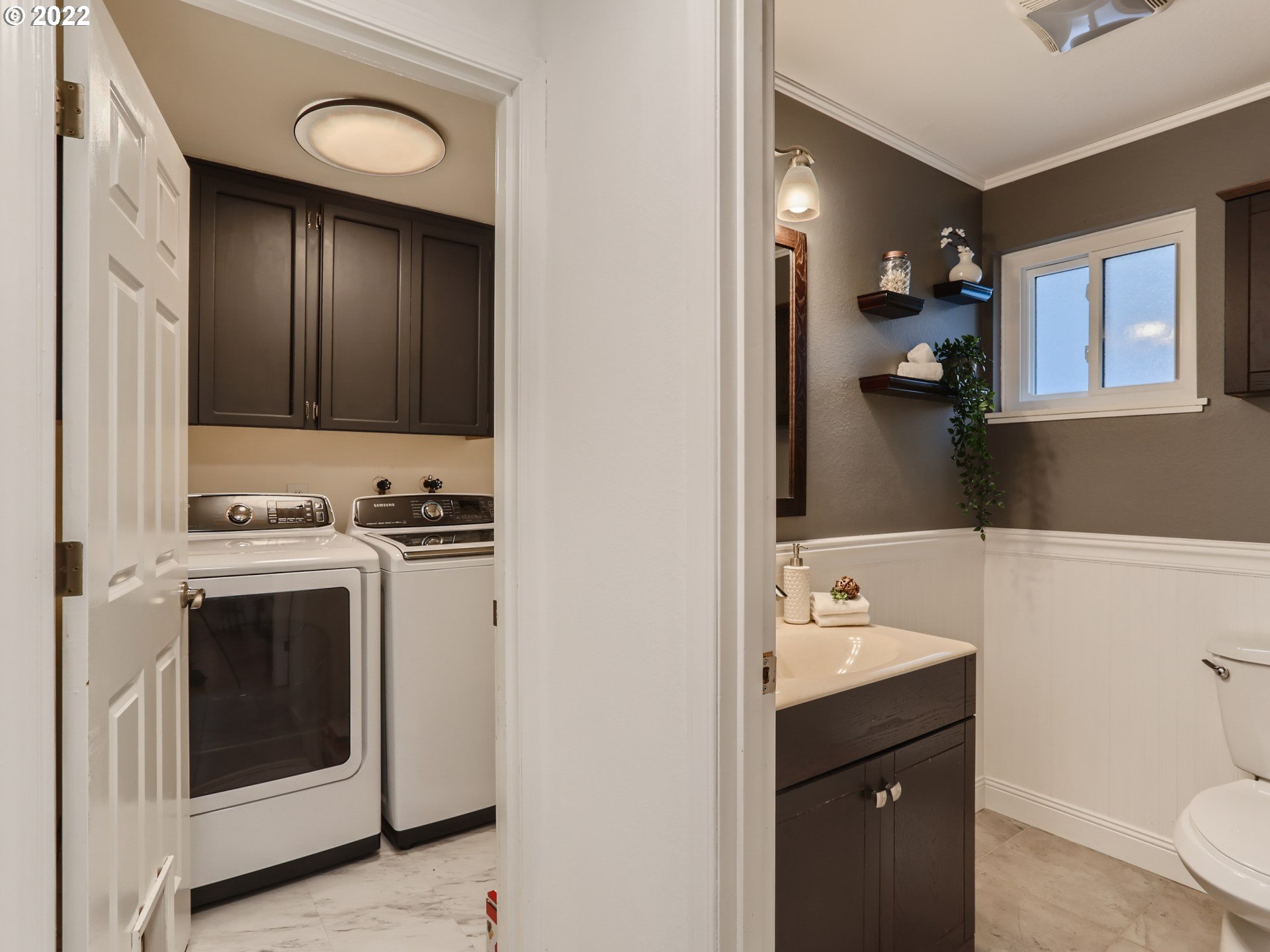 12300 Southwest Davies Road Beaverton, OR 97008 - Photo 17 of 31 a kitchen with a sink cabinets and appliances