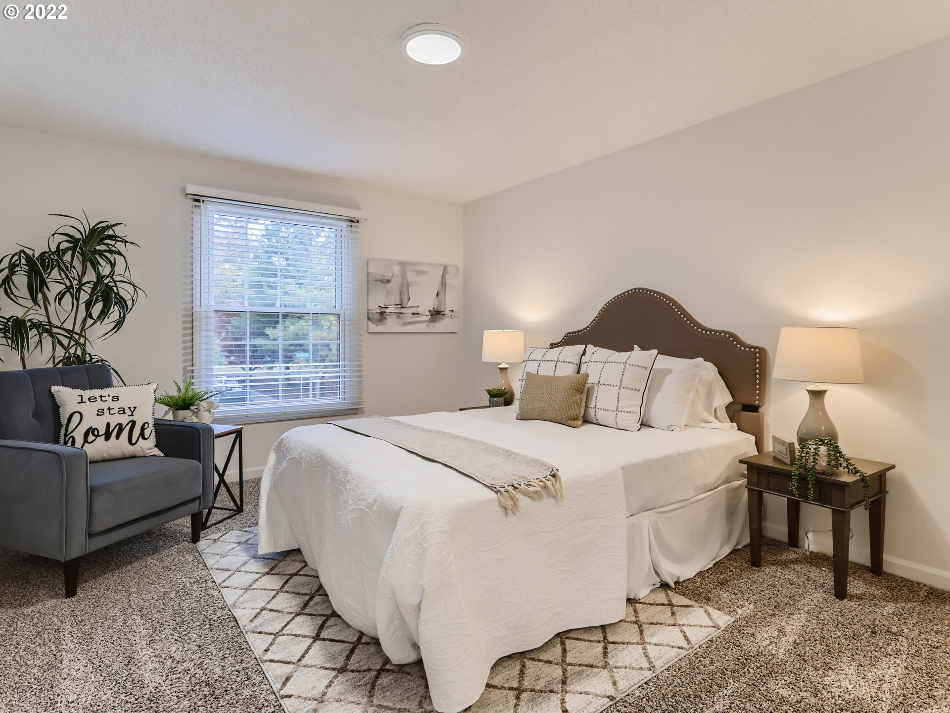 12300 Southwest Davies Road Beaverton, OR 97008 - Photo 19 of 31 a bedroom with a bed and a couch