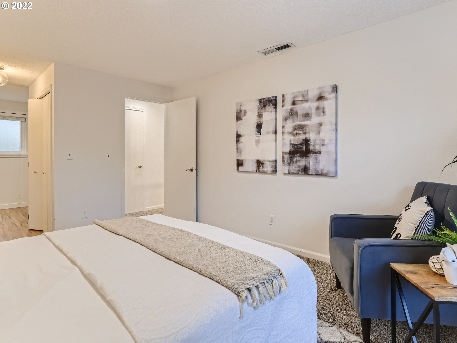 12300 Southwest Davies Road Beaverton, OR 97008 - Photo 20 of 31 a bedroom with a bed and a desk