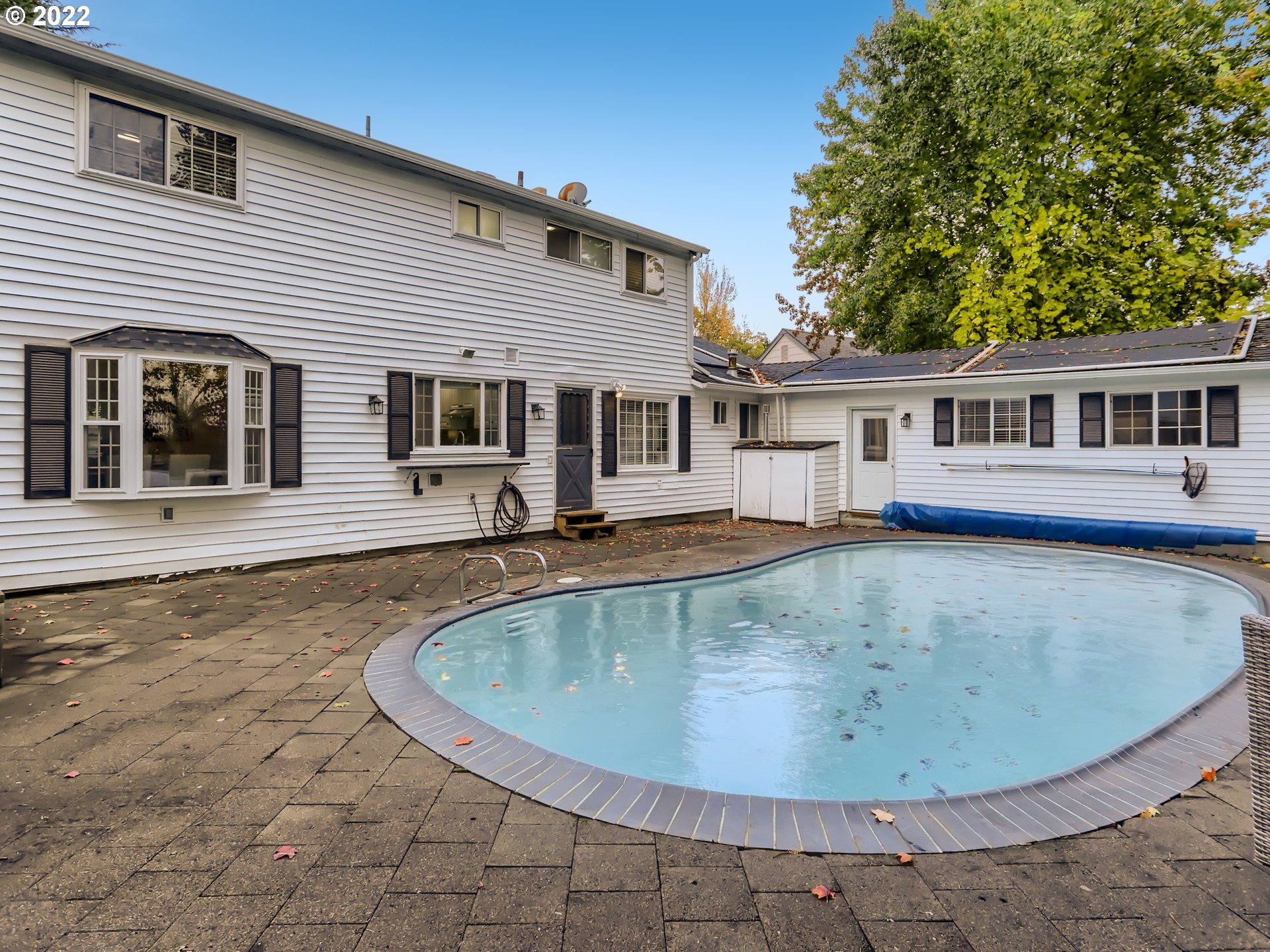 12300 Southwest Davies Road Beaverton, OR 97008 - Photo 30 of 31 a view of a house with a swimming pool