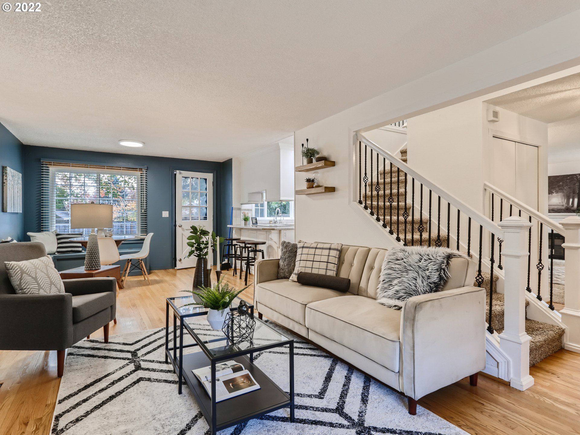 12300 Southwest Davies Road Beaverton, OR 97008 - Photo 3 of 31 a living room with furniture and wooden floor