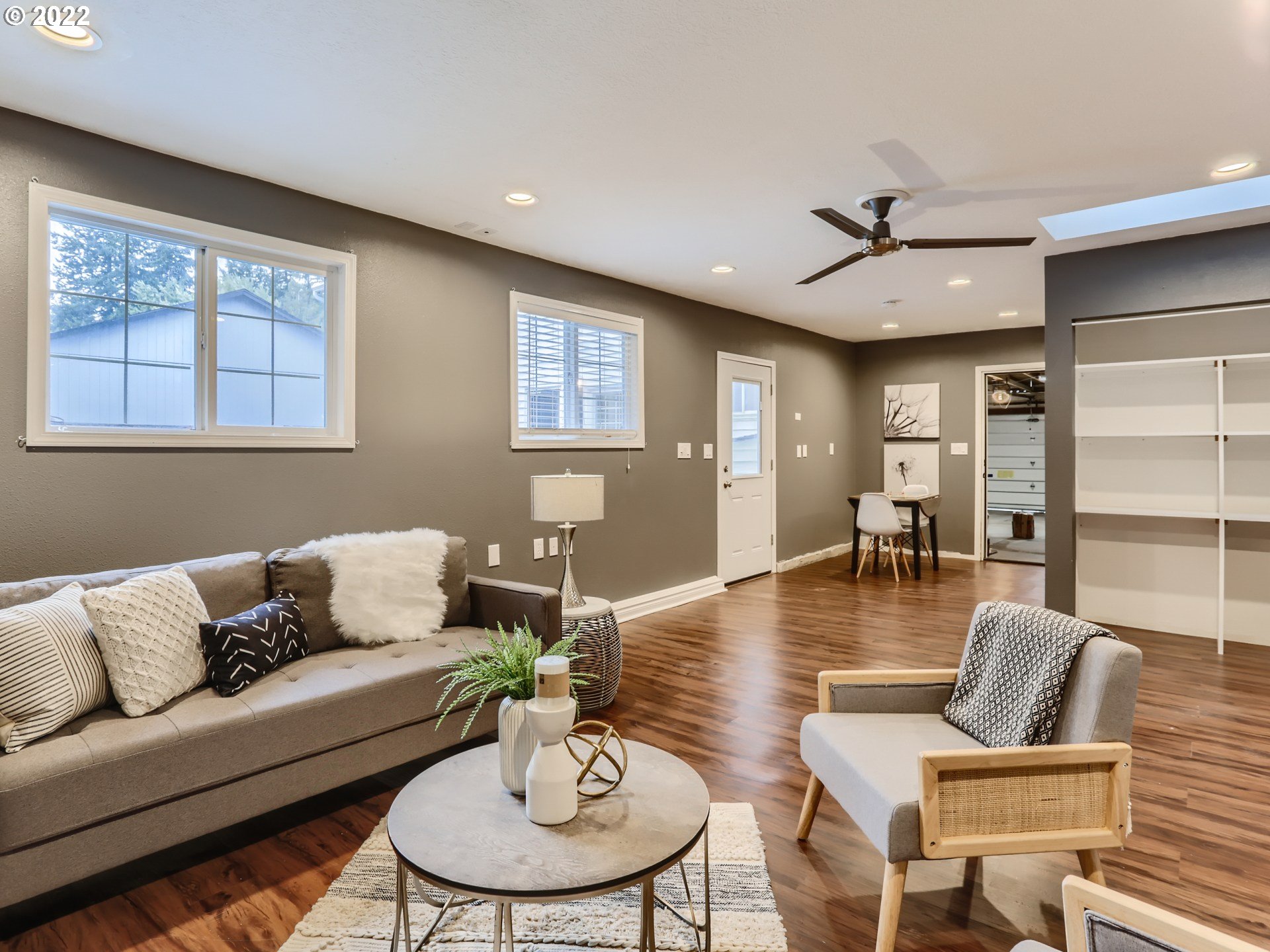 12300 Southwest Davies Road Beaverton, OR 97008 - Photo 4 of 31 a living room with furniture and wooden floor