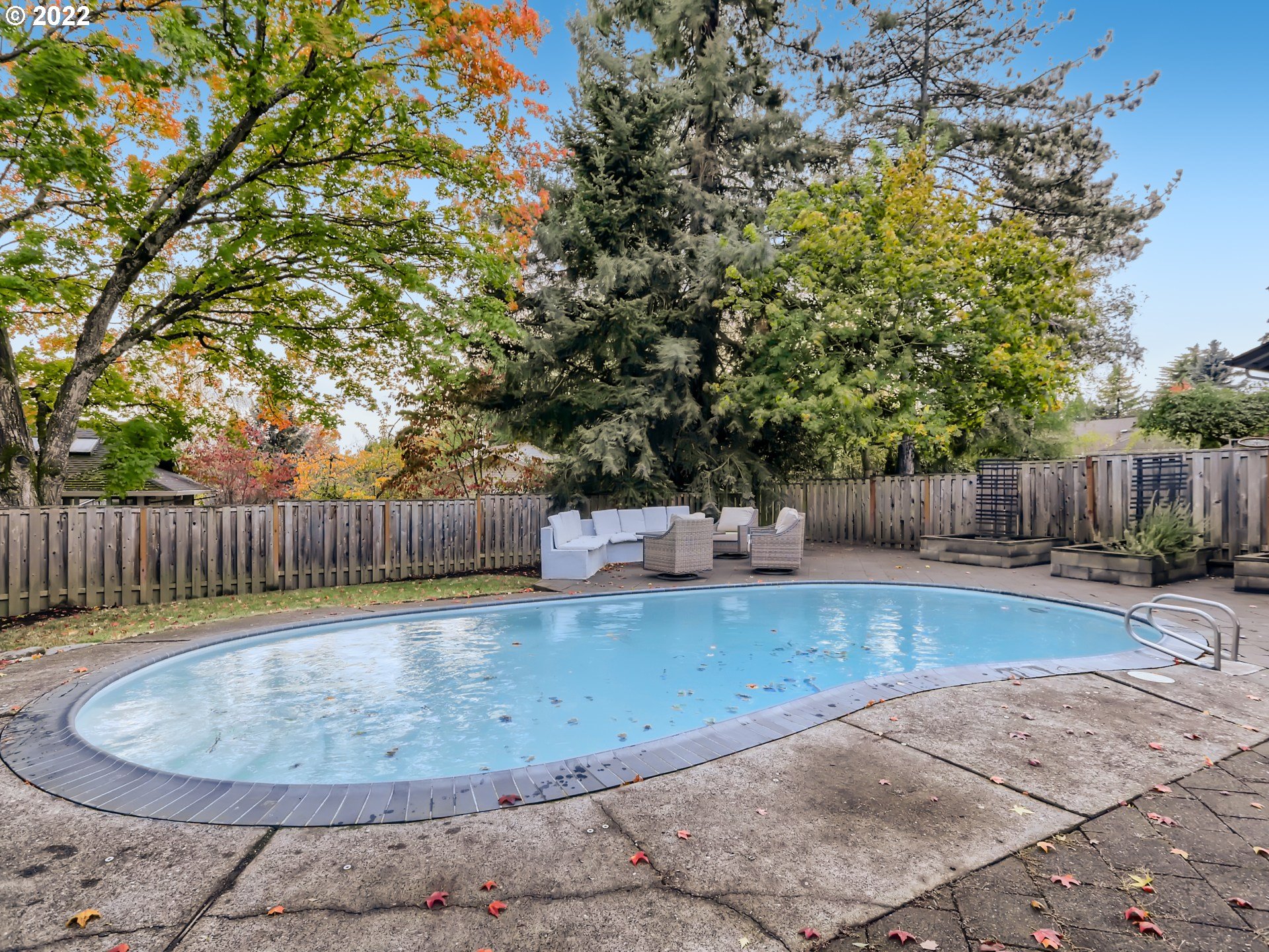 12300 Southwest Davies Road Beaverton, OR 97008 - Photo 5 of 31 a view of a backyard with wooden fence