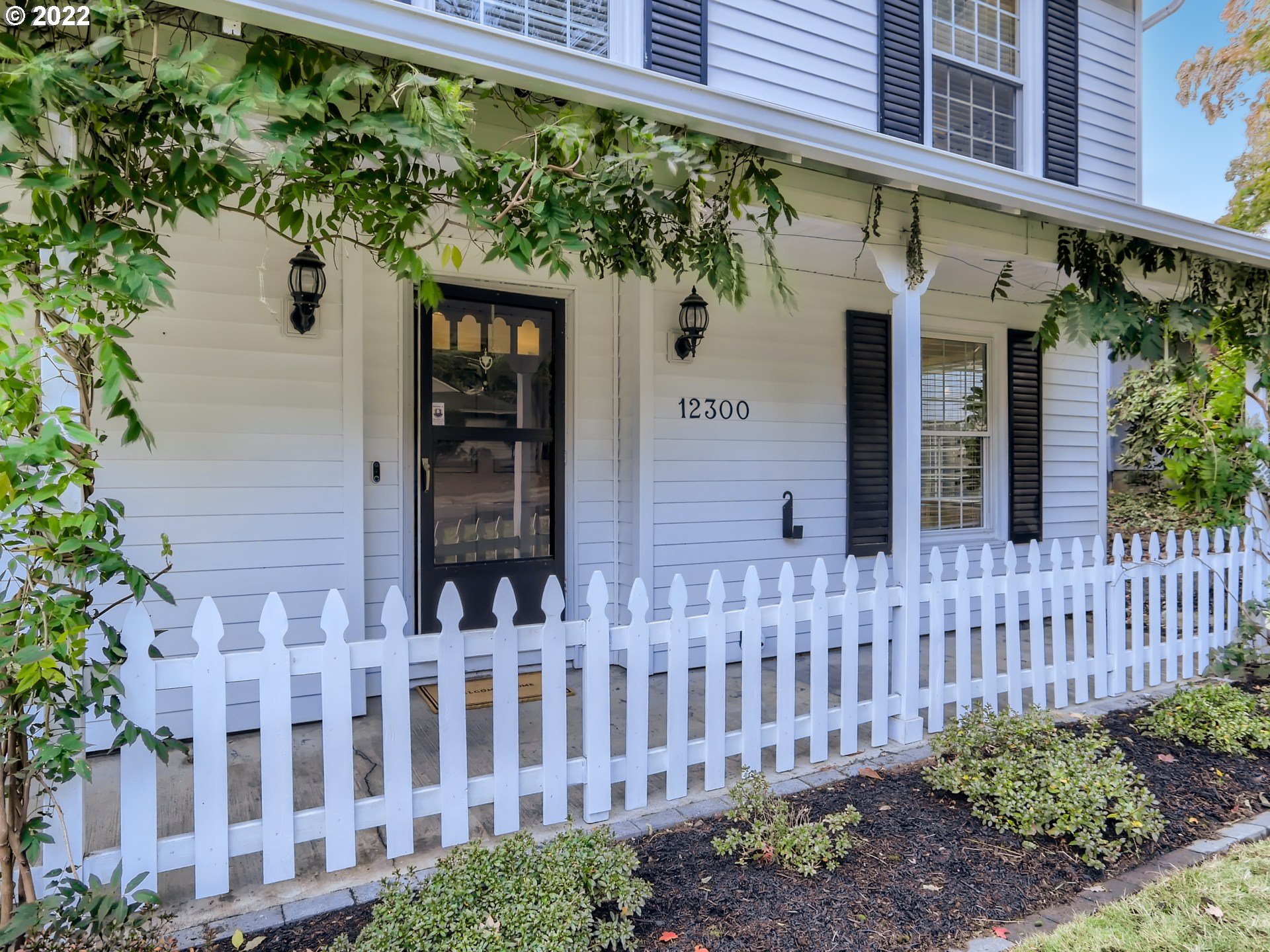 12300 Southwest Davies Road Beaverton, OR 97008 - Photo 6 of 31 front view of a house with a small garden