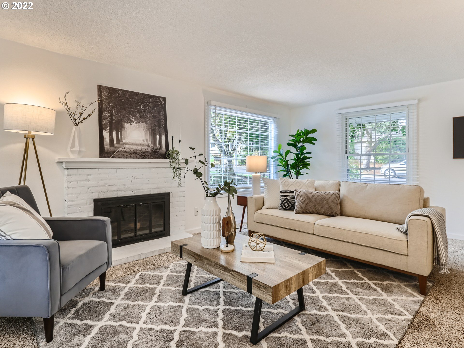 12300 Southwest Davies Road Beaverton, OR 97008 - Photo 10 of 31 a living room with furniture and a fireplace