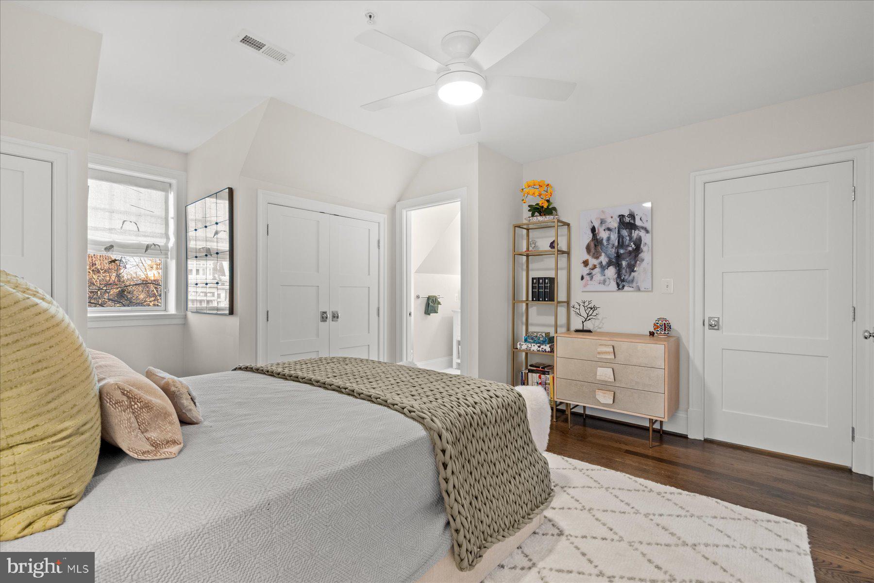 2014 Kalorama Road Northwest, Unit 7 Washington, DC 20009 - Photo 14 of 23 a bedroom with a bed and wooden floor