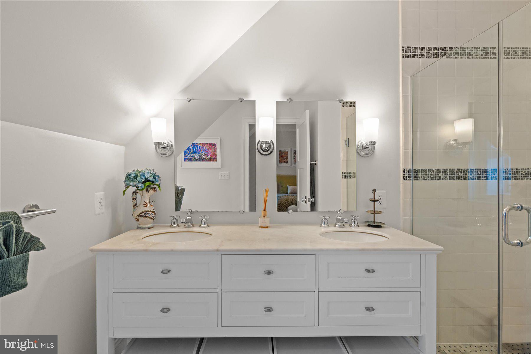 2014 Kalorama Road Northwest, Unit 7 Washington, DC 20009 - Photo 17 of 23 a bathroom with a sink and a mirror