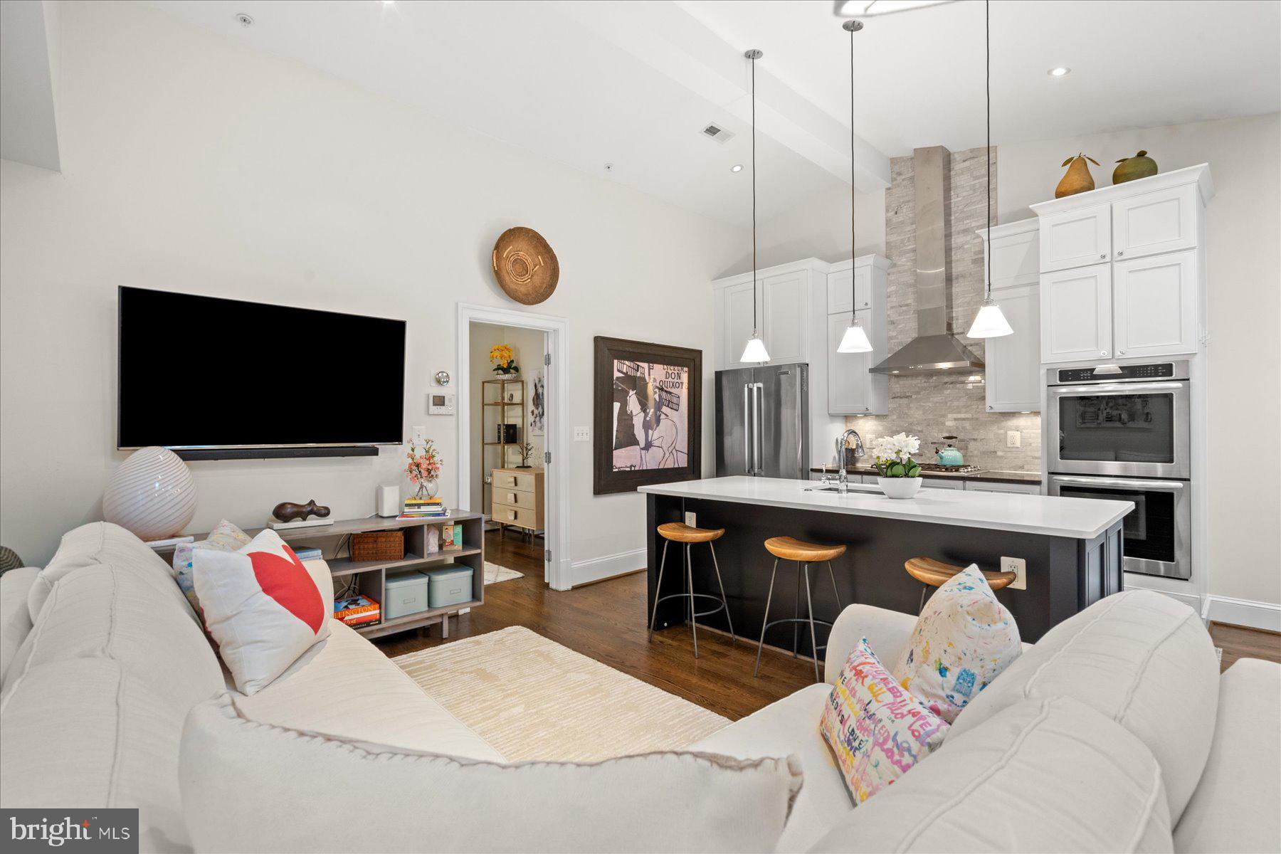 2014 Kalorama Road Northwest, Unit 7 Washington, DC 20009 - Photo 5 of 23 a living room with furniture and a flat screen tv