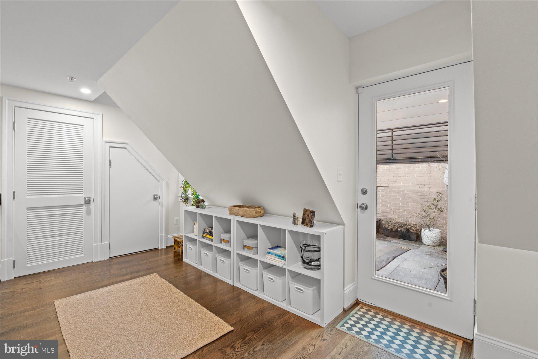 2014 Kalorama Road Northwest, Unit 7 Washington, DC 20009 - Photo 7 of 23 a living room with furniture and a rug
