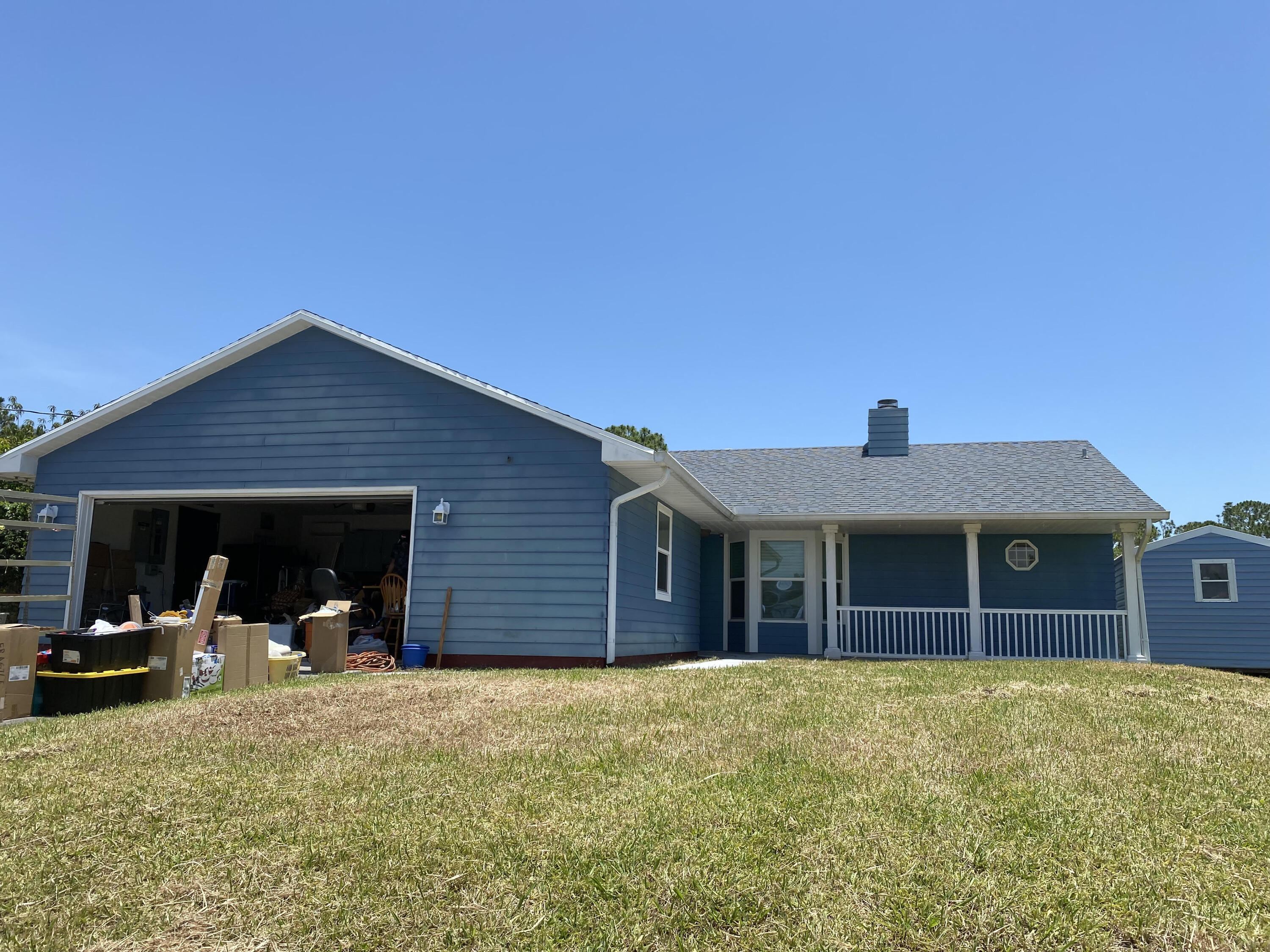 2367 Southwest Madrid Road Port St. Lucie, FL 34953 - Photo 1 of 8 FRT OF HOUSE