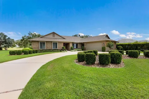a view of a house with a big yard