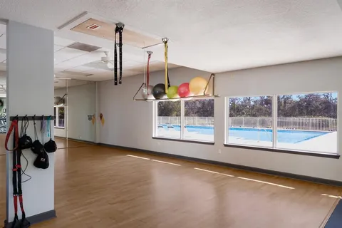 a view of a room with gym equipment