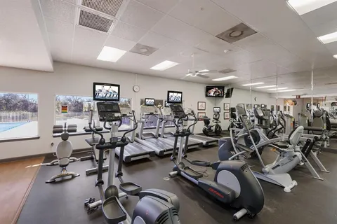 a view of a room with gym equipment